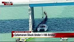 Catamaran Trapped Under Miami Bridge